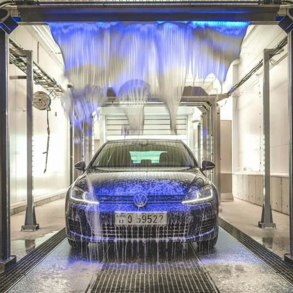 Automated car-wash tunnel in action